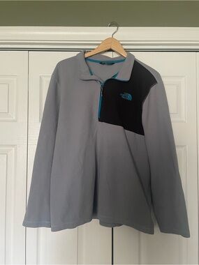 The North Face Black Fleece with Teal Logo